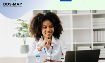  Image of a young woman, in an office, looking at her laptop. She is wearing a white button up shirt. DDS-Map Logo. Co-funded by the European Union logo. #EU4Health #HealTheUnion