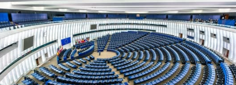 A photo of a room on the inside of the European Parliament.