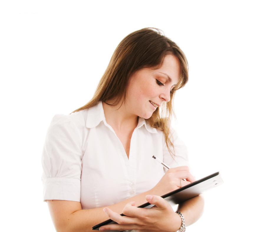 Image of a woman with long brown hair, filling in a document on a writing pad. 